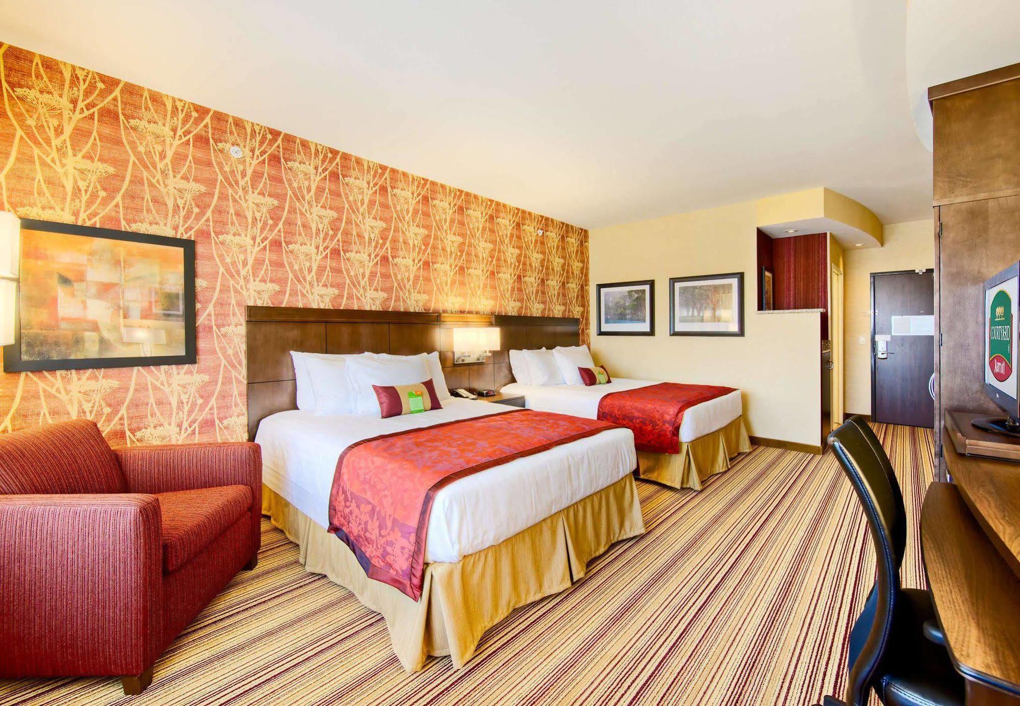 Отель Courtyard By Marriott Хаума Номер фото